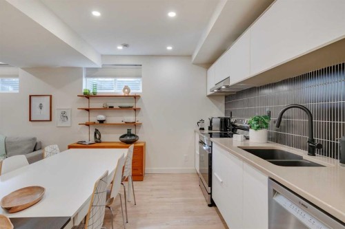 14 Rosetree Crescent Nw, Calgary, AB - Indoor Photo Showing Kitchen With Double Sink