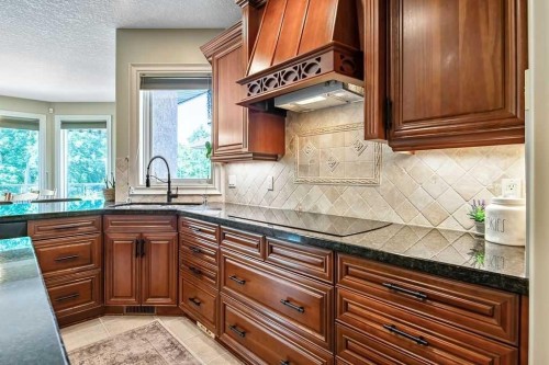 117 West Terrace Point, Cochrane, AB - Indoor Photo Showing Kitchen
