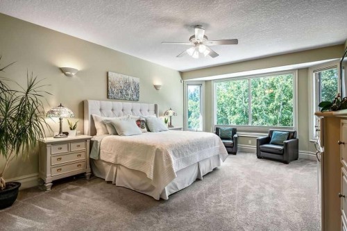 117 West Terrace Point, Cochrane, AB - Indoor Photo Showing Bedroom