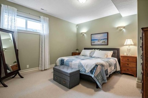 117 West Terrace Point, Cochrane, AB - Indoor Photo Showing Bedroom