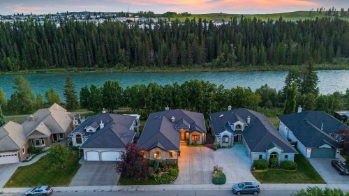 117 West Terrace Point, Cochrane, AB - Outdoor With Body Of Water With Facade With View