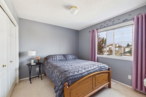 27 Bridlewood Park Sw, Calgary, AB - Indoor Photo Showing Bedroom