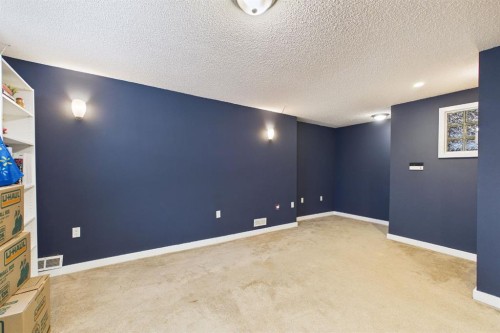 27 Bridlewood Park Sw, Calgary, AB - Indoor Photo Showing Other Room