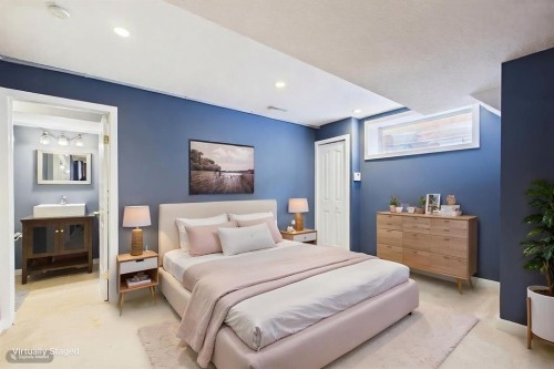 27 Bridlewood Park Sw, Calgary, AB - Indoor Photo Showing Bedroom