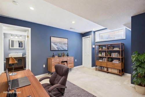 27 Bridlewood Park Sw, Calgary, AB - Indoor Photo Showing Other Room