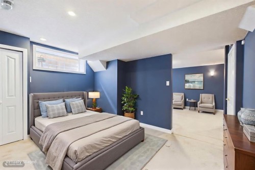 27 Bridlewood Park Sw, Calgary, AB - Indoor Photo Showing Bedroom