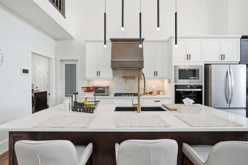 77 Wolf Hollow Villas Se, Calgary, AB - Indoor Photo Showing Kitchen With Upgraded Kitchen