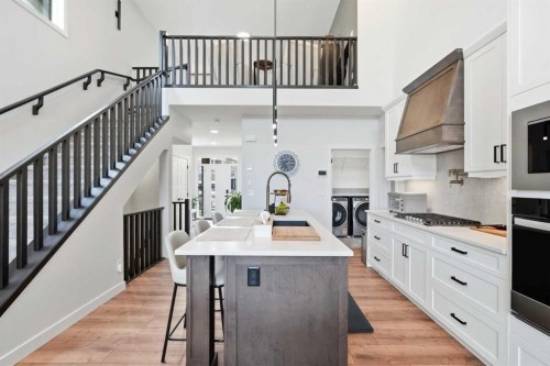 77 Wolf Hollow Villas Se, Calgary, AB - Indoor Photo Showing Kitchen With Upgraded Kitchen