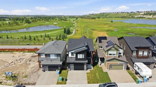 77 Wolf Hollow Villas Se, Calgary, AB - Outdoor With Facade With View