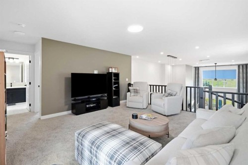 77 Wolf Hollow Villas Se, Calgary, AB - Indoor Photo Showing Living Room