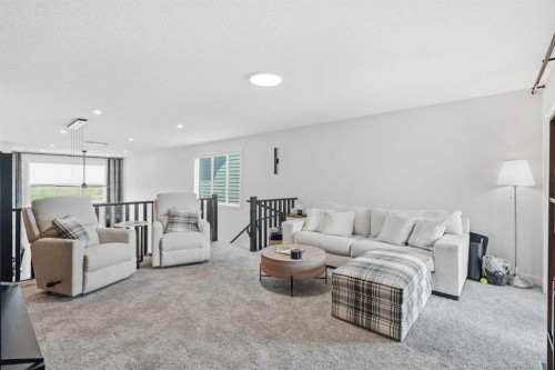 77 Wolf Hollow Villas Se, Calgary, AB - Indoor Photo Showing Living Room