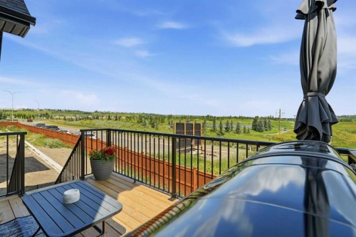 77 Wolf Hollow Villas Se, Calgary, AB - Outdoor With Deck Patio Veranda With Exterior