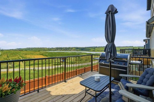 77 Wolf Hollow Villas Se, Calgary, AB - Outdoor With Deck Patio Veranda With View With Exterior