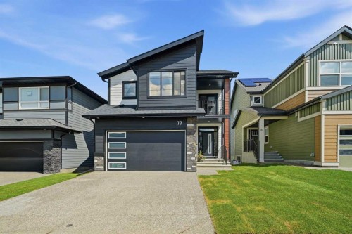 77 Wolf Hollow Villas Se, Calgary, AB - Outdoor With Facade