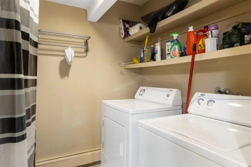 522-6400 Coach Hill Road Sw, Calgary, AB - Indoor Photo Showing Laundry Room