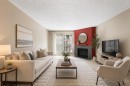 522-6400 Coach Hill Road Sw, Calgary, AB  - Indoor Photo Showing Living Room With Fireplace 