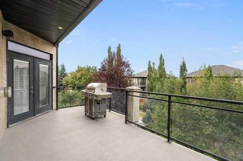 8 Coulee Park Sw, Calgary, AB - Outdoor With Balcony With Exterior