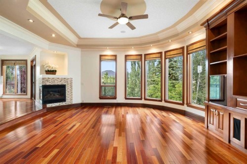 8 Coulee Park Sw, Calgary, AB - Indoor With Fireplace