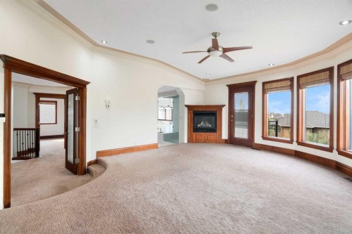 8 Coulee Park Sw, Calgary, AB - Indoor With Fireplace