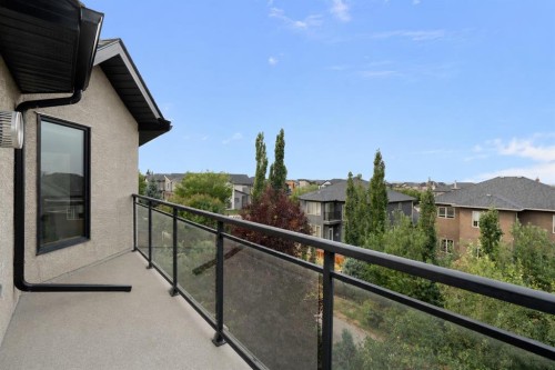 8 Coulee Park Sw, Calgary, AB - Outdoor With Balcony With Exterior