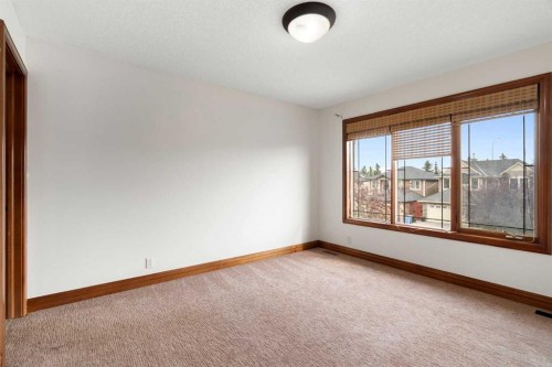 8 Coulee Park Sw, Calgary, AB - Indoor Photo Showing Other Room