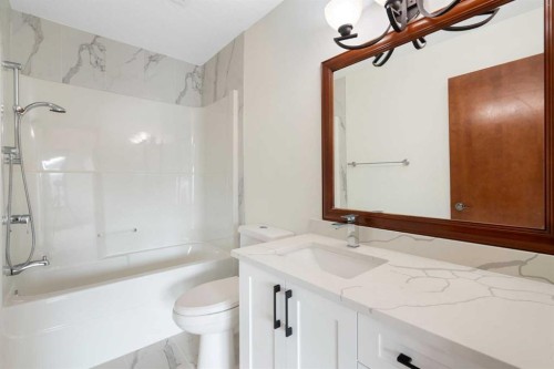 8 Coulee Park Sw, Calgary, AB - Indoor Photo Showing Bathroom