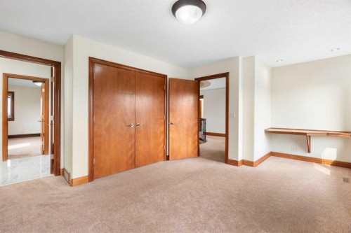 8 Coulee Park Sw, Calgary, AB - Indoor Photo Showing Other Room