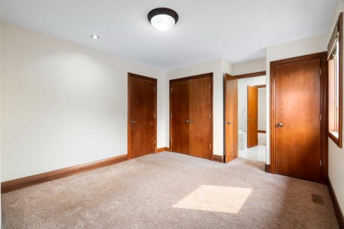 8 Coulee Park Sw, Calgary, AB - Indoor Photo Showing Other Room