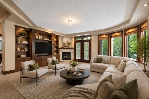 8 Coulee Park Sw, Calgary, AB - Indoor Photo Showing Living Room With Fireplace