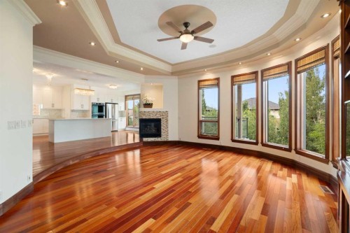8 Coulee Park Sw, Calgary, AB - Indoor With Fireplace