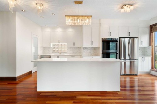 8 Coulee Park Sw, Calgary, AB - Indoor Photo Showing Kitchen With Upgraded Kitchen