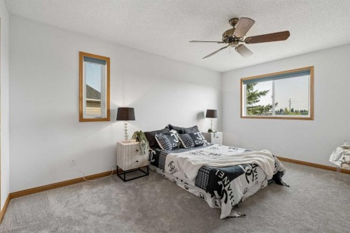 246 Mt Lorette Place Se, Calgary, AB - Indoor Photo Showing Bedroom