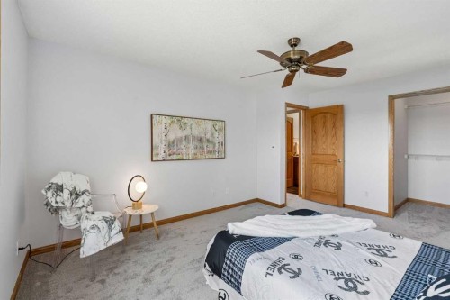 246 Mt Lorette Place Se, Calgary, AB - Indoor Photo Showing Bedroom