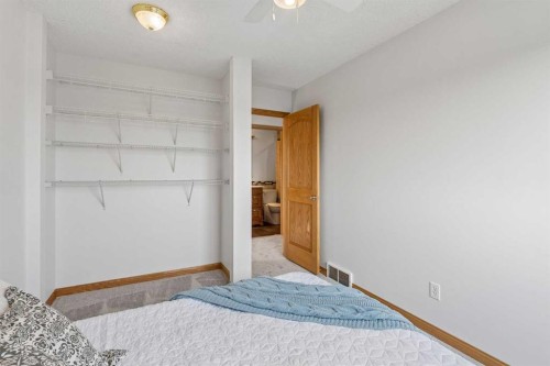 246 Mt Lorette Place Se, Calgary, AB - Indoor Photo Showing Bedroom
