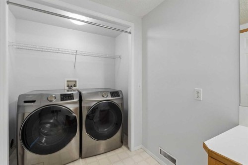 246 Mt Lorette Place Se, Calgary, AB - Indoor Photo Showing Laundry Room