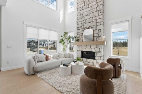 507 Waterford Rise, Chestermere, AB - Indoor Photo Showing Living Room With Fireplace
