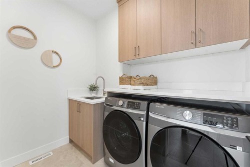 507 Waterford Rise, Chestermere, AB - Indoor Photo Showing Laundry Room