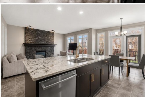 495 Cranford Drive Se, Calgary, AB - Indoor Photo Showing Other Room With Fireplace