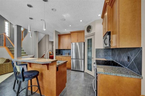 146 Springborough Point Sw, Calgary, AB - Indoor Photo Showing Kitchen With Upgraded Kitchen