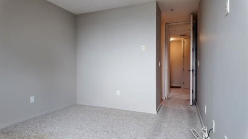 1103-105 Railway Avenue Sw, Airdrie, AB - Indoor Photo Showing Other Room