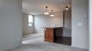 1103-105 Railway Avenue Sw, Airdrie, AB  - Indoor Photo Showing Other Room 