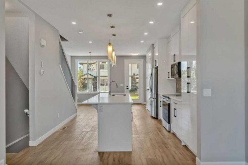 28A Green Meadow Crescent, Strathmore, AB - Indoor Photo Showing Kitchen With Upgraded Kitchen