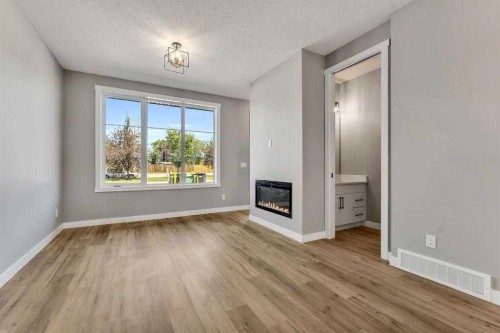 28A Green Meadow Crescent, Strathmore, AB - Indoor With Fireplace