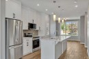 28A Green Meadow Crescent, Strathmore, AB  - Indoor Photo Showing Kitchen With Upgraded Kitchen 