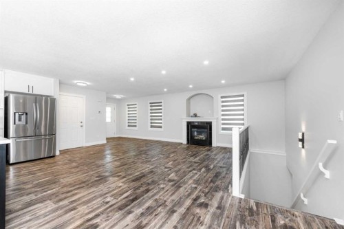 192 Cove Rise Rise, Chestermere, AB - Indoor With Fireplace