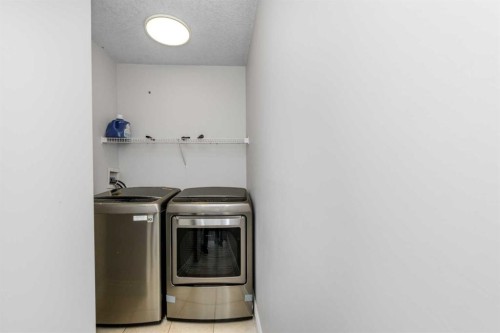 192 Cove Rise Rise, Chestermere, AB - Indoor Photo Showing Laundry Room