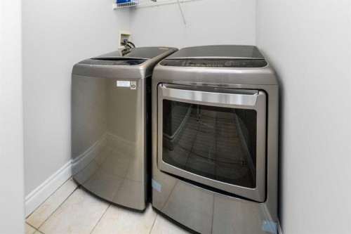 192 Cove Rise Rise, Chestermere, AB - Indoor Photo Showing Laundry Room