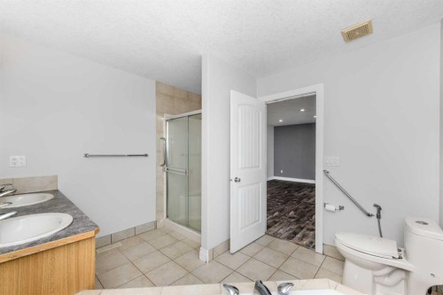 192 Cove Rise Rise, Chestermere, AB - Indoor Photo Showing Bathroom
