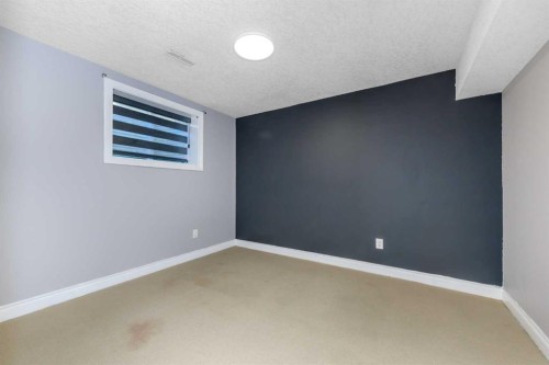 192 Cove Rise Rise, Chestermere, AB - Indoor Photo Showing Other Room