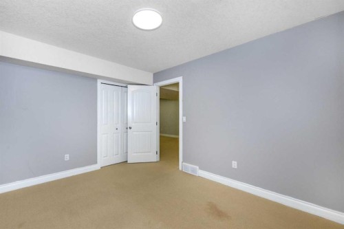 192 Cove Rise Rise, Chestermere, AB - Indoor Photo Showing Other Room